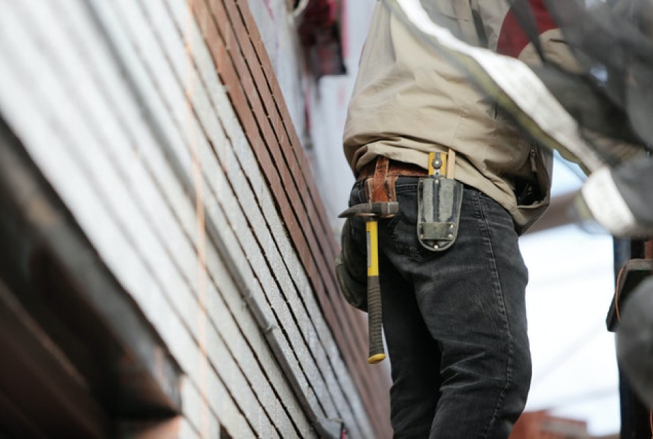 man wearing a tool belt